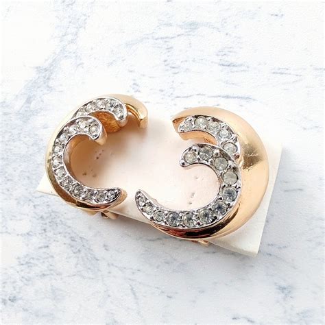 《PUCCINI》 crescent moon clear rhinestone vintage earrings プッチーニ ヴィンテージ ...
