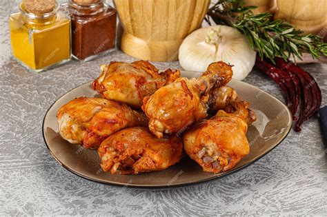 Premium Photo | Raw marinated chicken drumstick for roast or bake