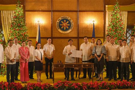 PBBM signs 2025 General Appropriations Act; DBM Sec Mina Pangandaman ...