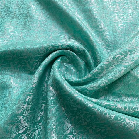 Buy Aqua Blue Floral Brocade Fabric Online at TradeUNO – TradeUNO Fabrics
