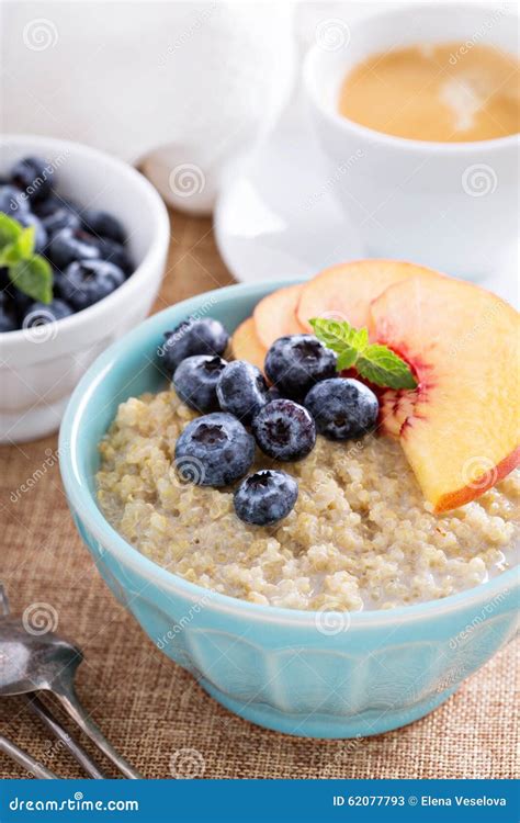 Quinoa Porridge With Green Pea, Corn And Dried Tomatoes On Ceramic Plate Isolated On White ...