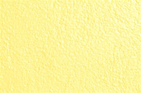 Download Pastel Yellow Concrete Wall Paint Wallpaper | Wallpapers.com