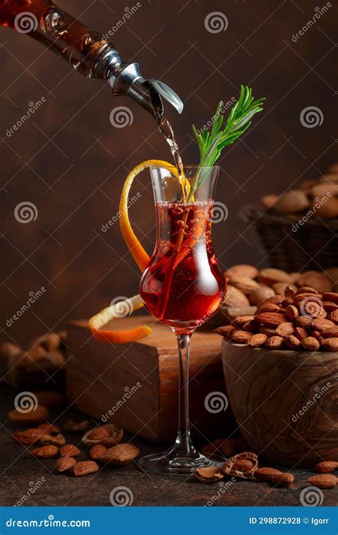 Italian Liqueur Amaretto with Almonds Nuts Stock Photo - Image of brandy, gold: 298872928