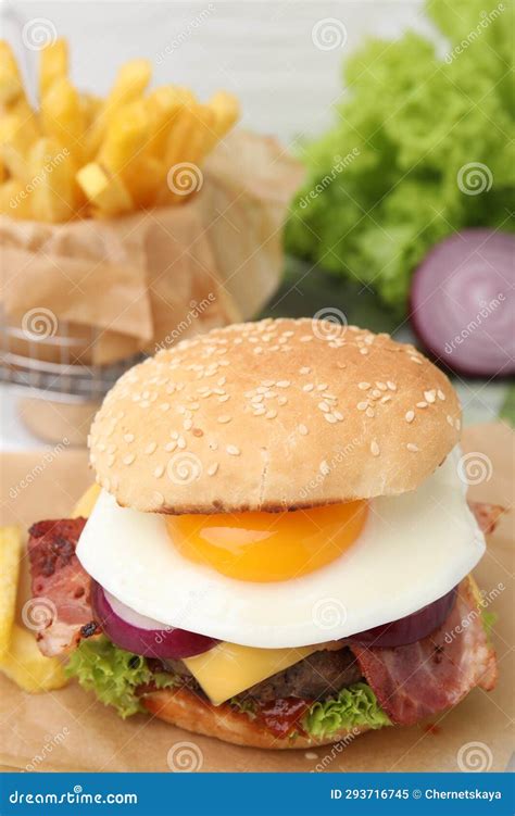 Delicious Burger with Fried Egg on Table, Closeup. Space for Text Stock ...