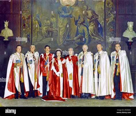 Queen Elizabeth II, Prince Charles and others, in official robes worn for an Order of the Bath ...