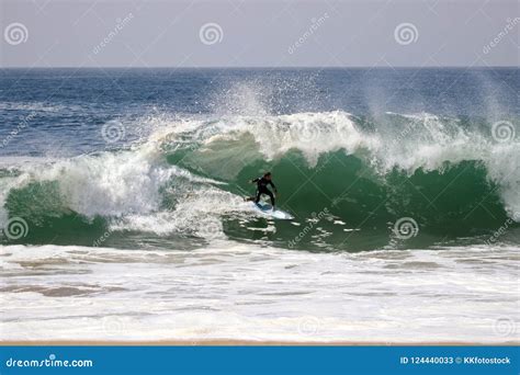 Surfer Surfing a Large Wave at the Wedge in Newport Beach California ...