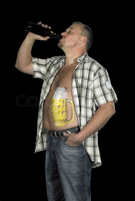 drinking man with beer belly | Stock image | Colourbox