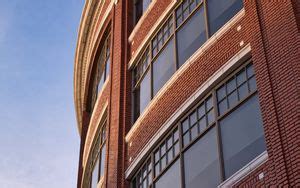 Wallpaper building, facade, windows, glass, sky hd, picture, image