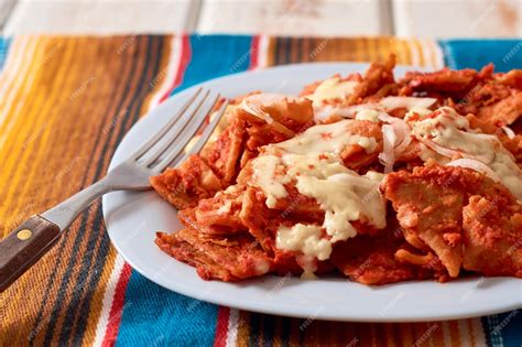 Premium Photo | Mexican red chilaquiles traditional mexican breakfast