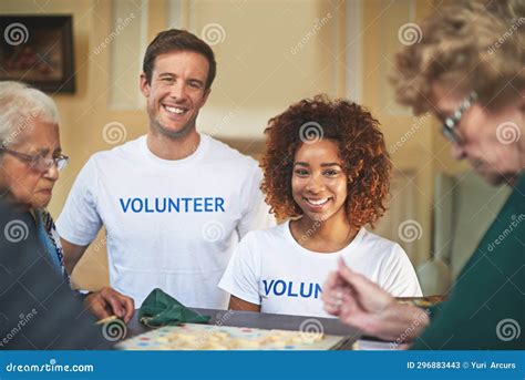 Making a Difference. Portrait of Volunteers Working with Seniors at a ...