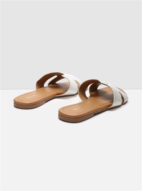 Buy Women Textured Slip-On Flat Sandals Online at just Rs. 549.0 ...