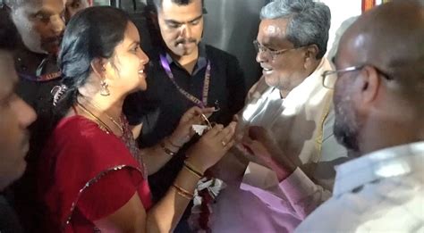 Student presents garland made of free bus tickets to CM Siddaramaiah to ...