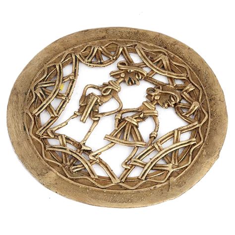 Old Brass Vase With Golden Floral Design At The Base