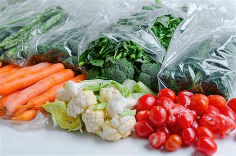 Frozen vegetable bags on white background | Premium AI-generated image