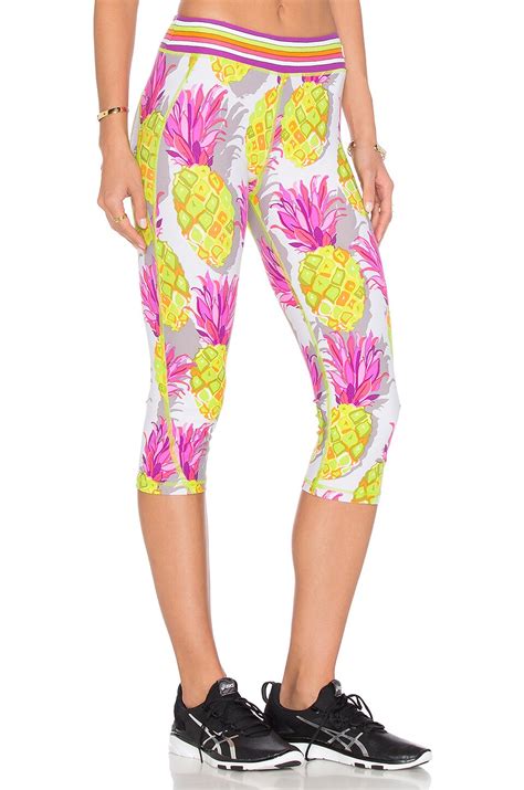 Trina Turk Pineapples Mid Length Legging in Multi | REVOLVE