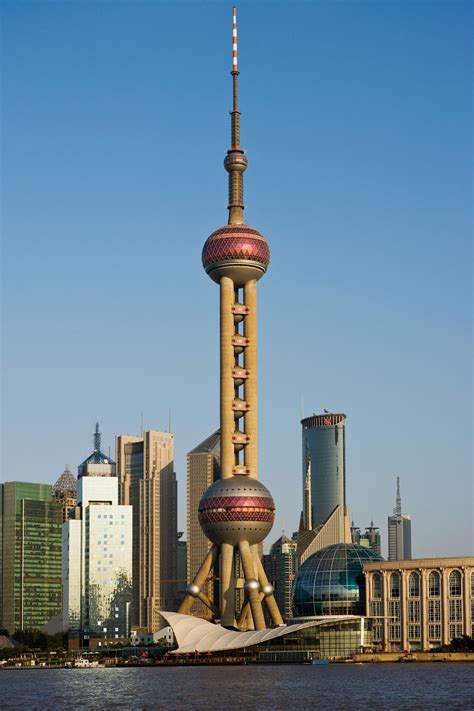 Towering high above Pudong New Area, the Oriental Pearl TV Tower has ...