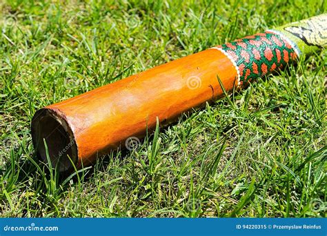 Didgeridoo on the grass stock image. Image of wood, aboriginal - 94220315