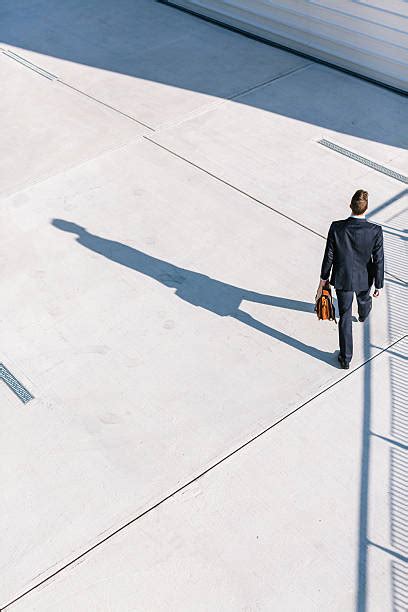 Business People Walking Aerial View 的图像结果