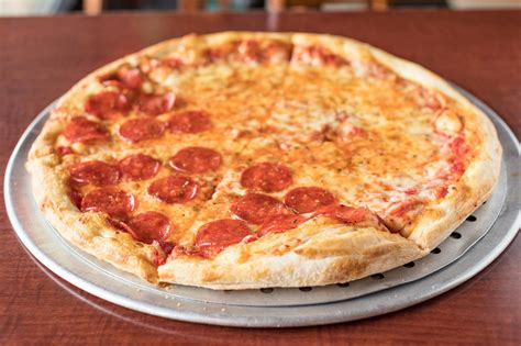 Johnny's Pizza Shop Menu & Delivery Eau Claire WI 54701 | EatStreet.com