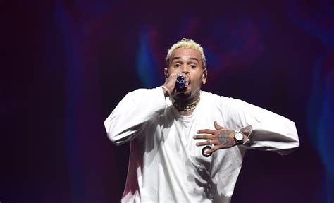 Chris Brown arrested in Manchester over alleged bottle attack that ...