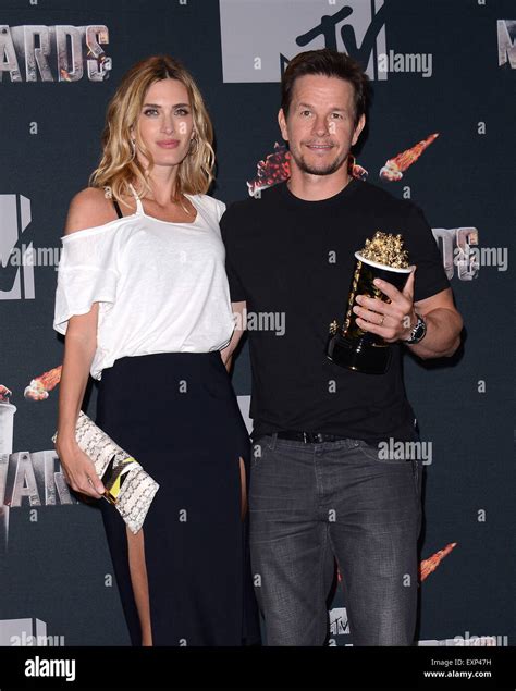 Mark Wahlberg and Rhea Durham at the 2014 MTV Movie Awards - Press Room ...