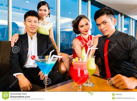 Chinese People Drinking Cocktails in Luxury Cocktail Bar Stock Image ...