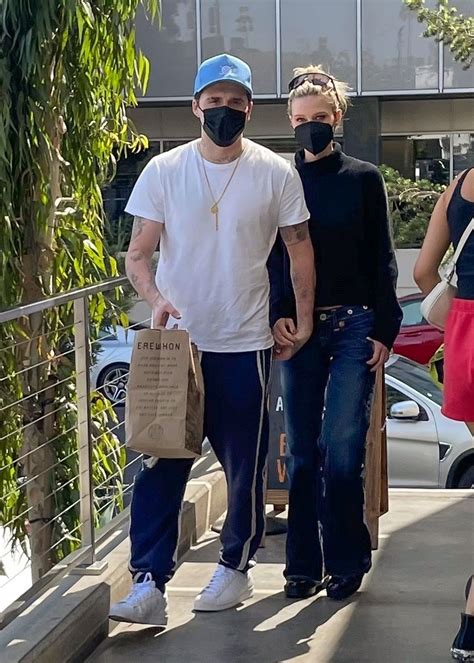 NICOLA PELTZ and Brooklyn Beckham Shopping at Erewhon Market in Santa ...