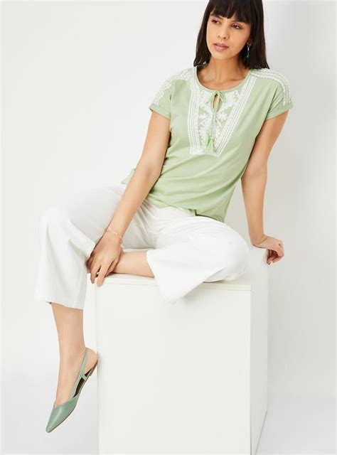 Buy Women Printed Tie-Up Neck Top Online at just Rs. 399.0 ...