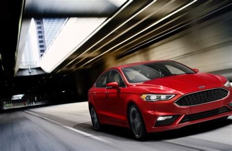 Ford unveils all-wheel drive and hybrid versions of Fusion at Detroit ...