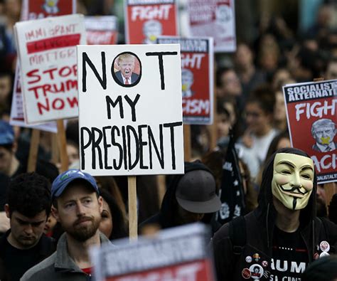 Trump-Protesting Students Burn Flags at American University | Newsmax.com