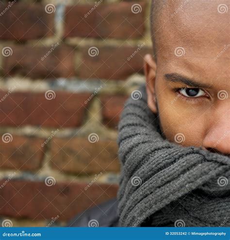 Attractive Male Fashion Model with Scarf Covering Face Stock Photo ...