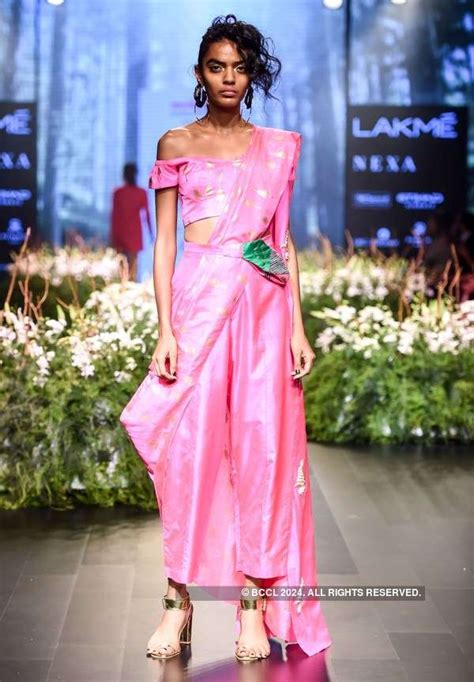 Designer Masaba Gupta’s collection is showcased by a model as she walks ...