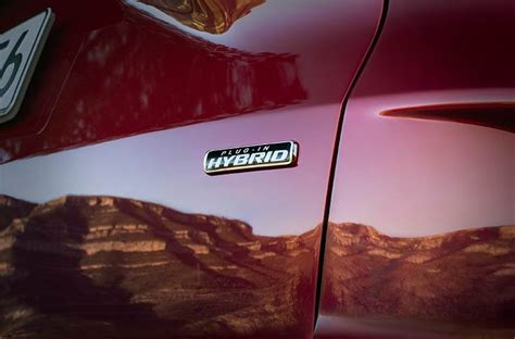 Ford reveals new electric cars with its first hybrid powertrain ...
