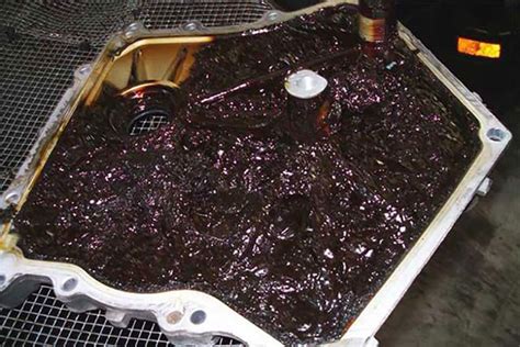 https://cdn.carcomplaints.com/minisites/img/vw/oil-sludge.jpg