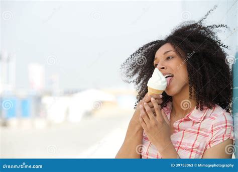 Young Woman Licking Ice Cream Stock Image - Image of girl, looking ...