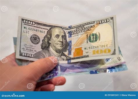Cash in Hand. Canadian Dollars Vs. US Dollars, Which are Important for Board Trading between ...