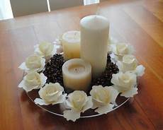 come decorare candele centrotavola con di carta pigne e candele come decorare candele centrotavola con di carta pigne e candele