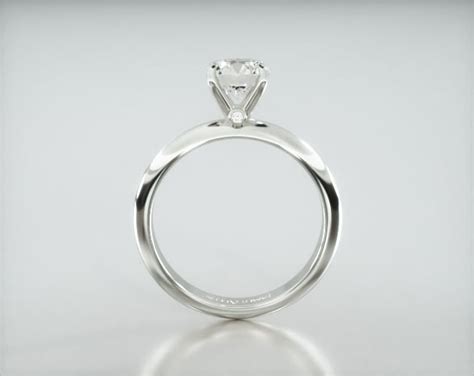 Knife Edge Solitaire Engagement Ring Embellished With a Four Prong ...