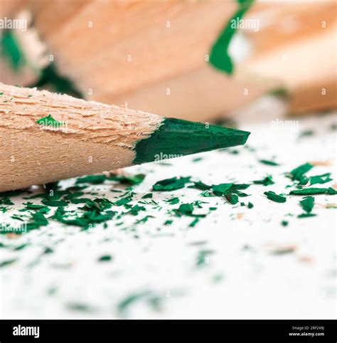 pencil shavings after sharpening, wood debris and parts of pencil lead ...