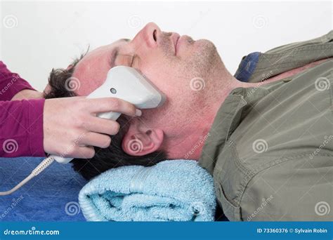 Close-up of Beautician Giving Laser Epilation Treatment To Man Face Stock Photo - Image of ...