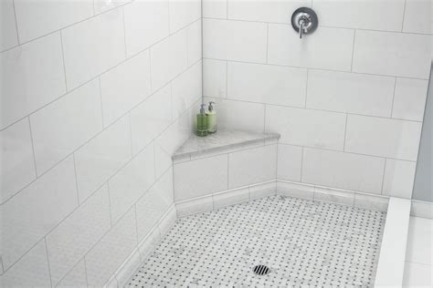 Carrara Chateau Marble Triangle Shower Bench | Floor and Decor