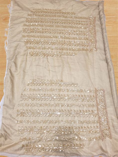 Golden Sequined Embroidered Net Lehenga with Floral and Zari Work ...