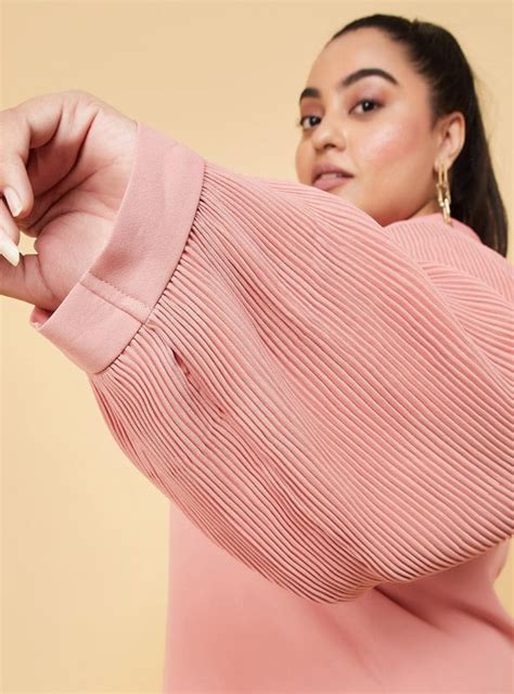 Buy Women Solid Tie-Up Neck Top Online at just Rs. 1099.0 ...