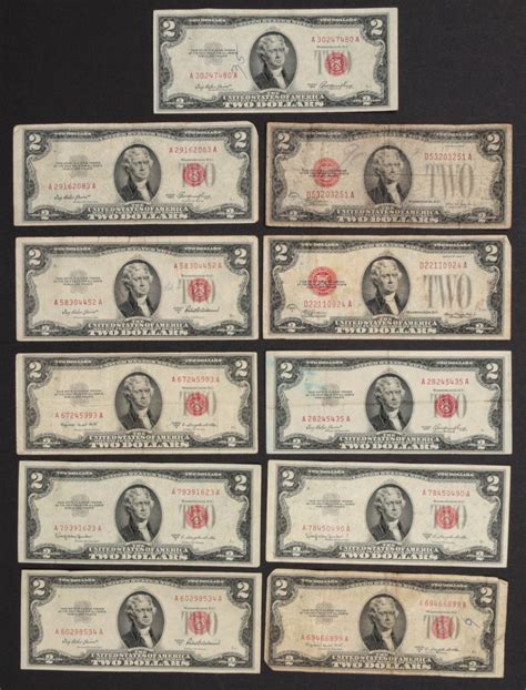 #11855: ELEVEN RED SEAL 1920s TWO DOLLAR BILLS