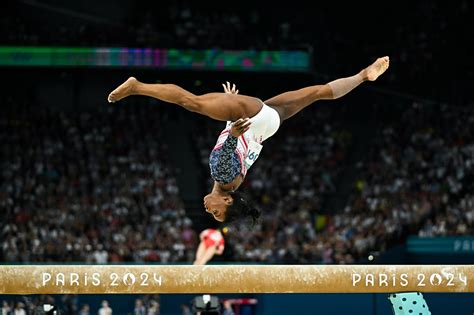 Triumphant Simone Biles leads USA to Olympic gymnastics team gold
