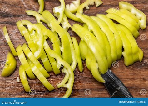 Chopped Bell Pepper on a Wooden Board. Preparation for Cooking Stock ...