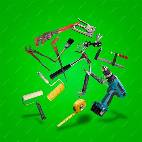 Set of work tools on green gradient | Premium Photo