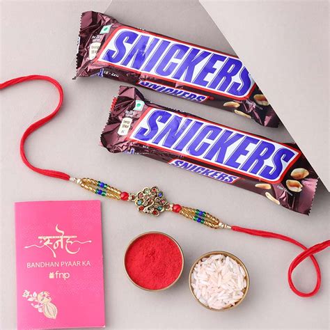 Send Sneh Designer Peacock Rakhi with Snickers Chocolates Online