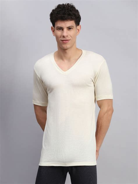 Buy Men Cream Solid V Neck Half Sleeve Thermal Vest Online in India ...