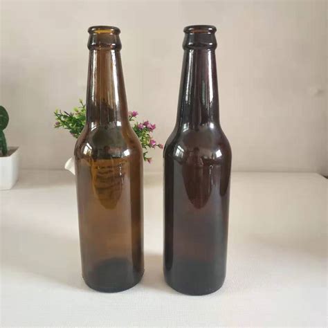 厂家直销批发棕色330ml带盖玻璃啤酒瓶空酒瓶高温支持定做logo-阿里巴巴